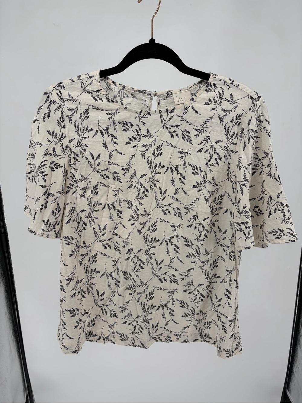 a new day white Blouse with black Floral Print